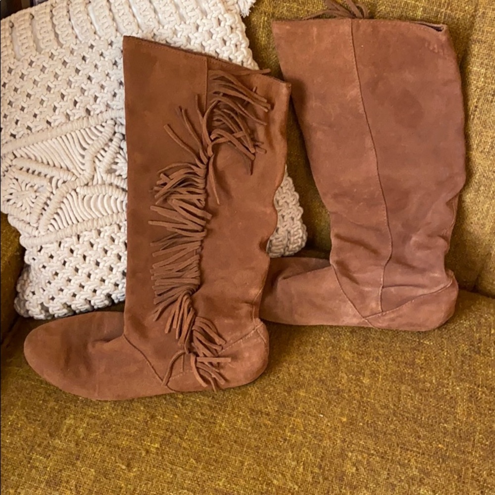 Leather knee high moccasin boots